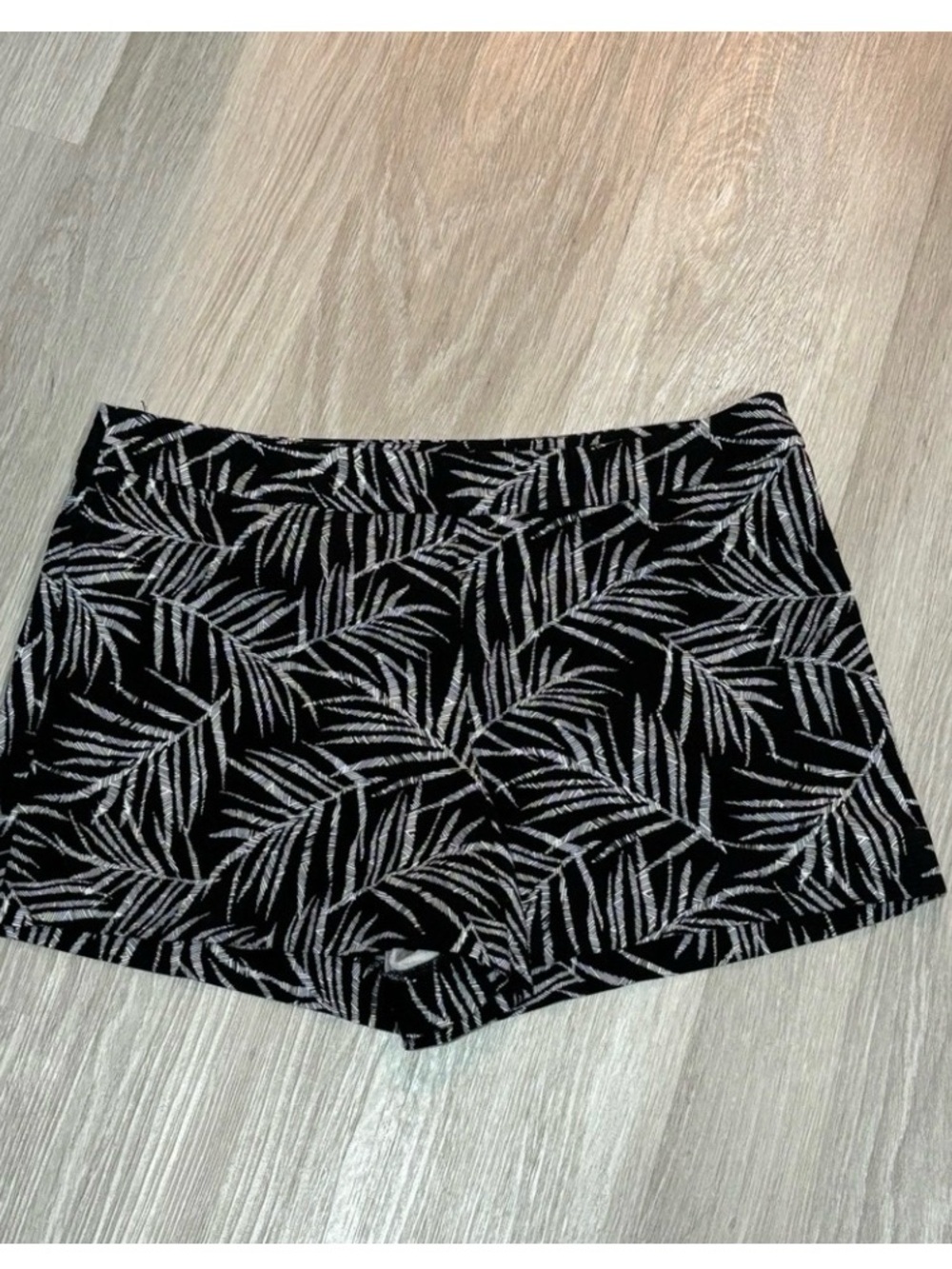 Margaret M Lea Printed Slimming Black Shorts with White Leaf Print